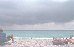 Tanning on the pebble beach in Nice, on the French Riviera. Photo: &copy; www.keithsarver.com